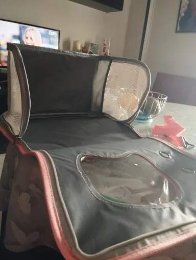 Soft shoulder carrier photographed by a verified buyer