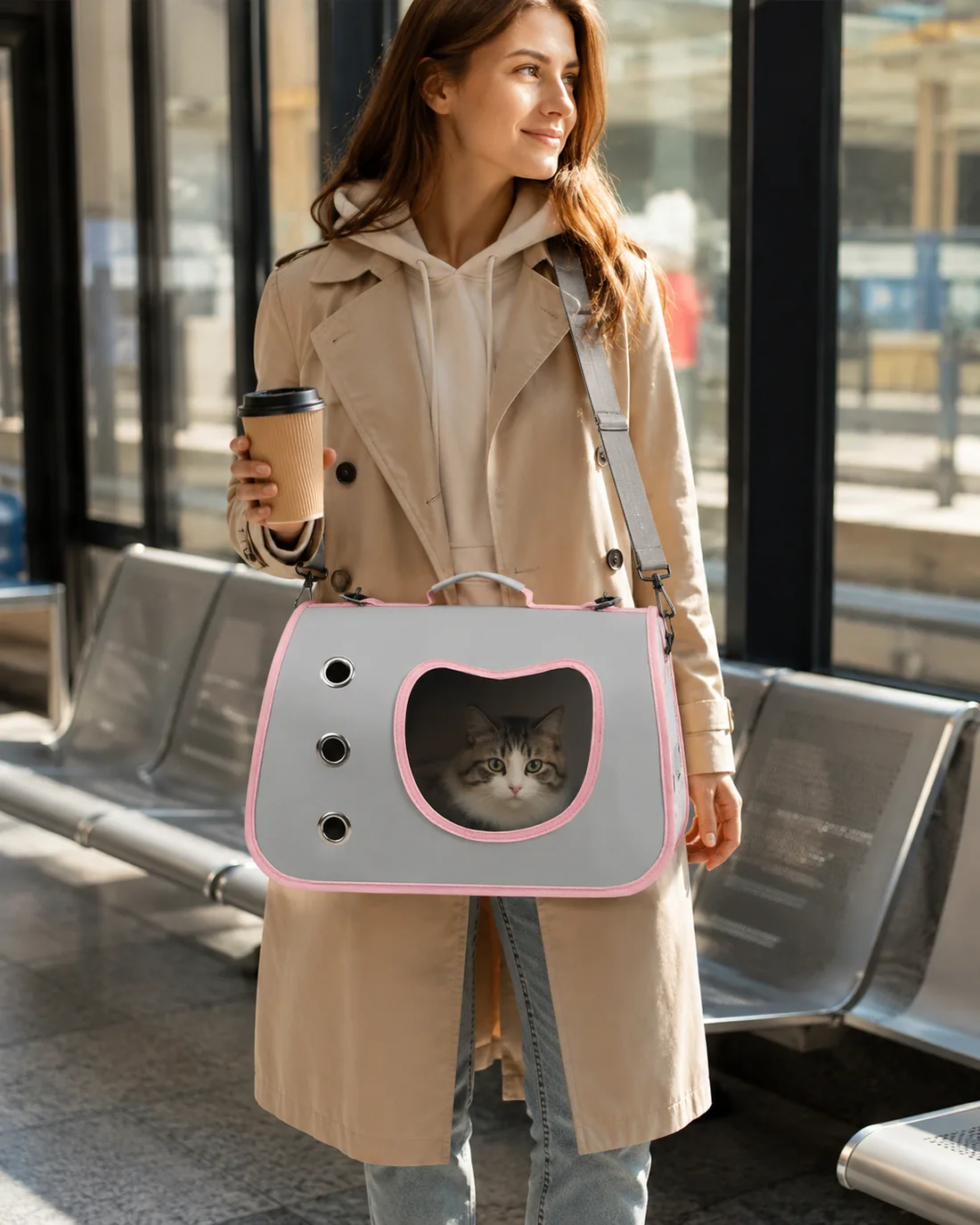 The carrier worn across the body on a station platform
